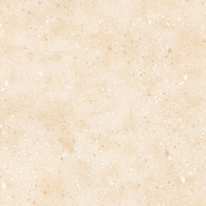 A mottled ivory colored fabric with light tan and white spatters all over