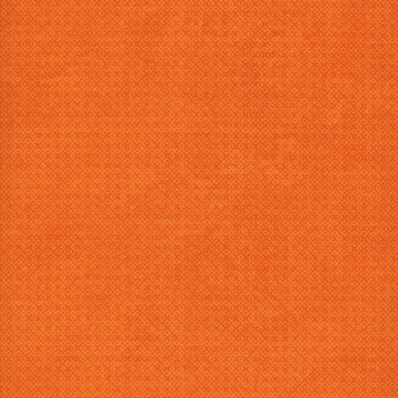 orange fabric featuring a criss crossing textured design