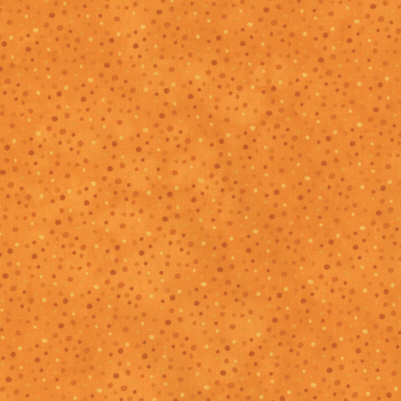 Orange fabric with scattered orange and taupe polka dots