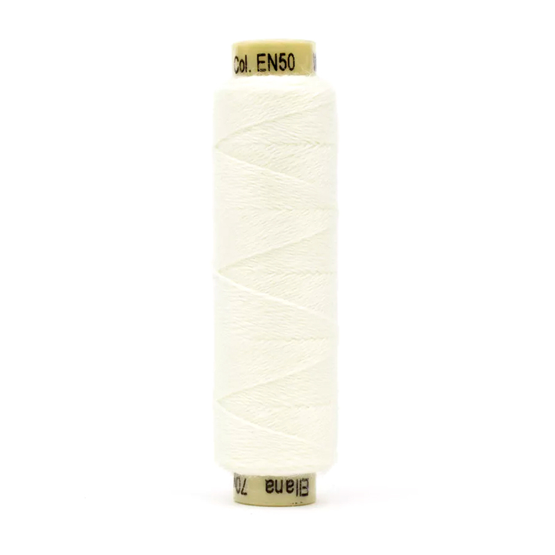 A spool of the Ellana EN50 - Parchment thread on a white background