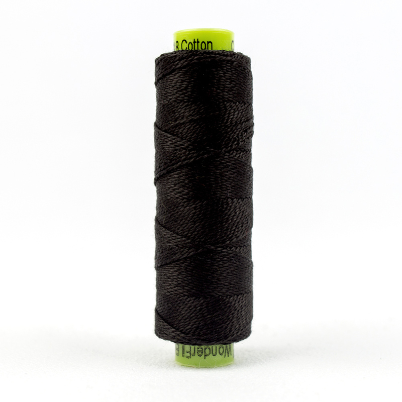 A spool of WonderFil Eleganza #8 EZ05 Black Tie thread on a white background