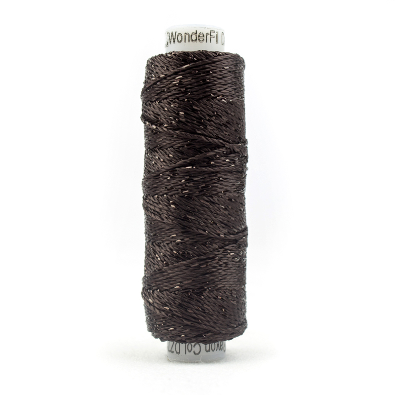 A spool of WonderFil Dazzle DZ7125 Licorice thread on a white background