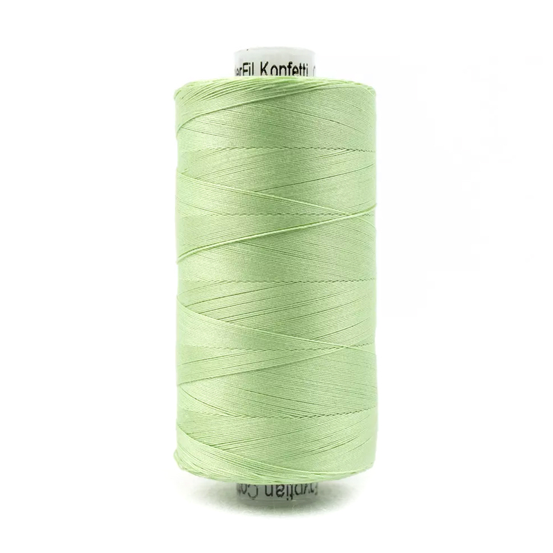 A spool of Konfetti KT706 - Mint Green thread on a white background