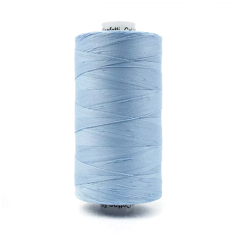 A spool of Konfetti KT609 - Sky Blue thread on a white background