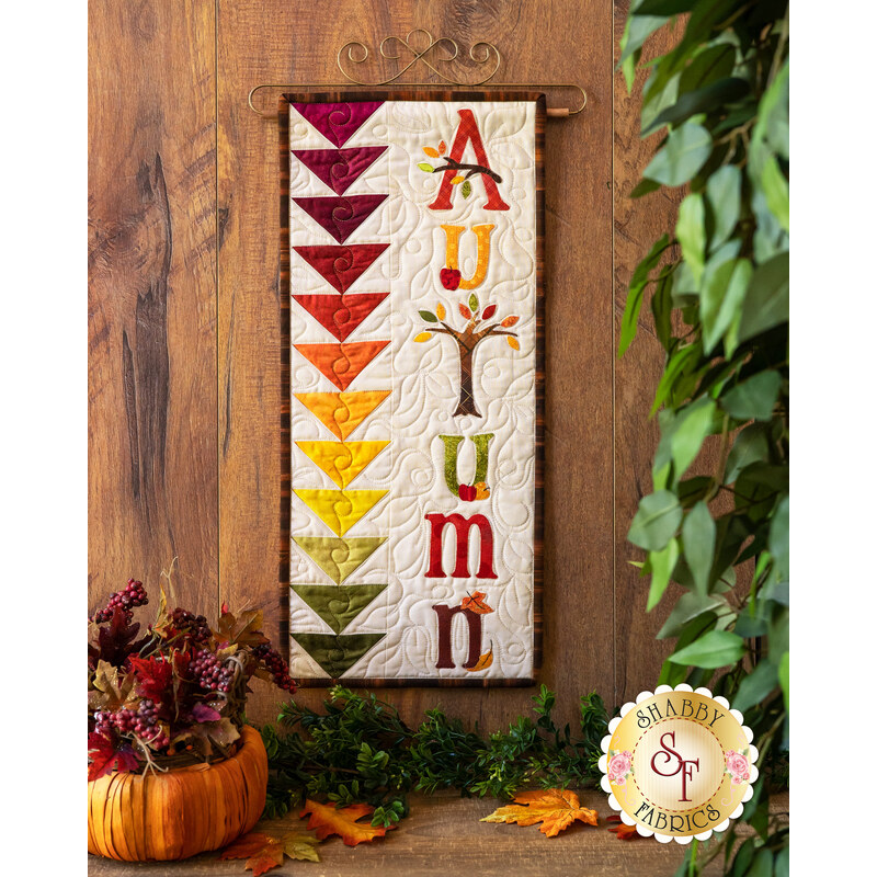 Kit for September A Year In Words wall hanging reading Autumn with fall color scheme.