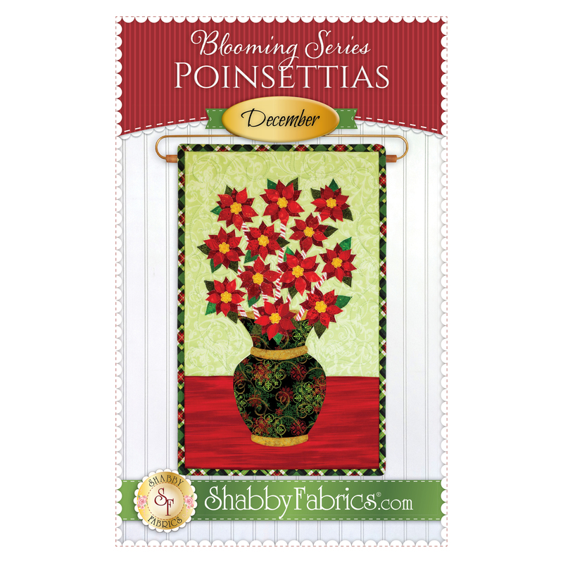 The front of the Blooming Series - December pattern by Shabby Fabrics showing the finished project with a bouquet of poinsettias.