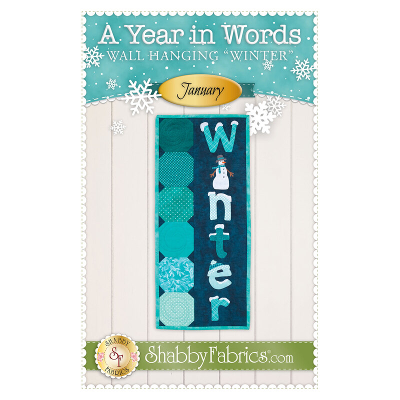 The front of the A Year In Words Wall Hangings - January pattern by Shabby Fabrics showing the finished wall hanging with the word Winter appliquéd on the background with six snowball blocks down the side.