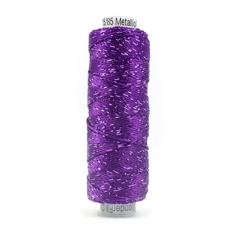 A spool of WonderFil Dazzle DZ5110 Sparkling Grape thread on a white background