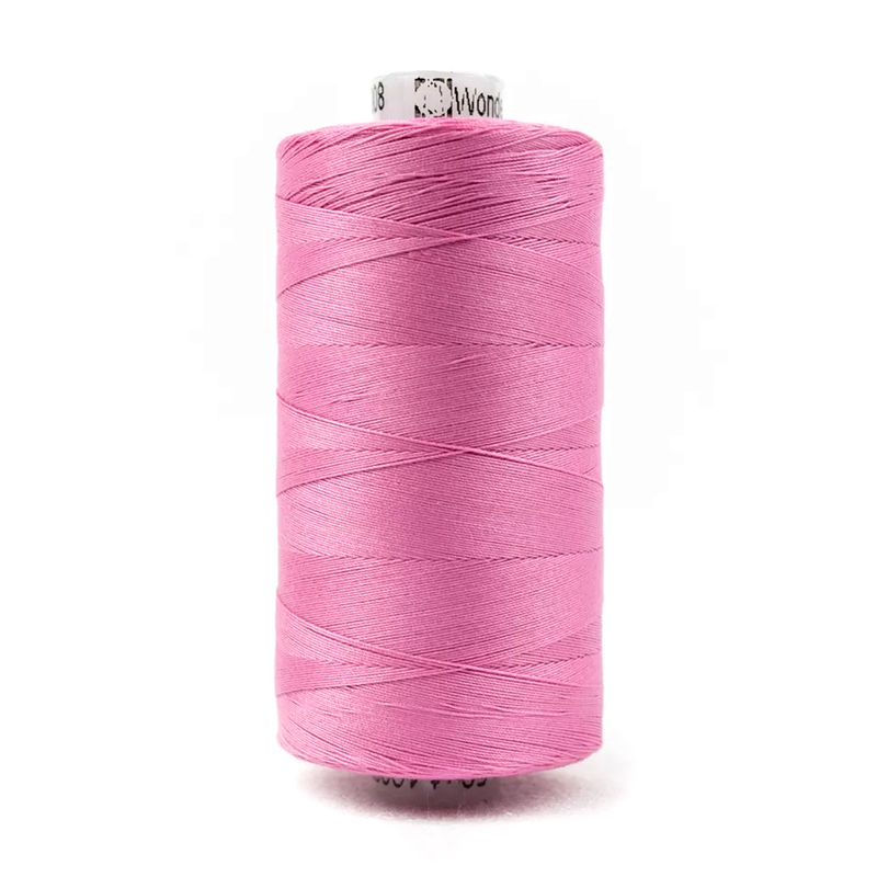 Spool of KT308 Carnation Pink thread on a white background