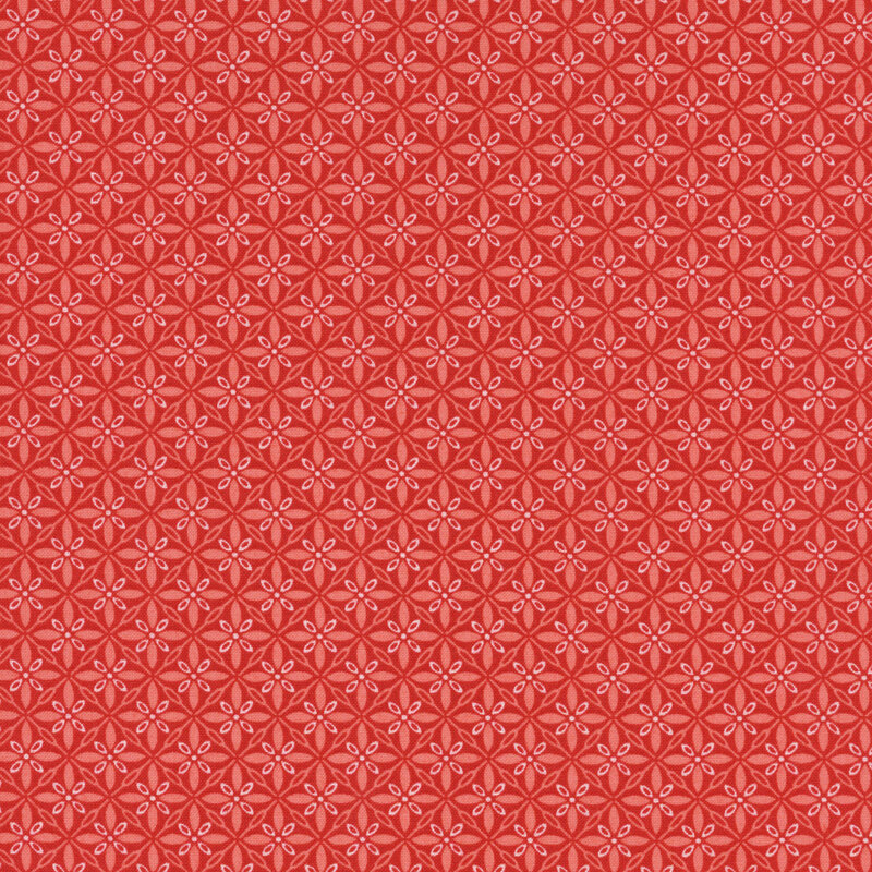 lovely red fabric featuring a geometric tuft design in lighter shades of red