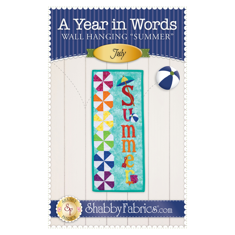 The front of the A Year In Words Wall Hanging - July pattern by Shabby Fabrics showing the finished wall hanging with the word Summer appliquéd on the background with beach balls of different colors down the side.
