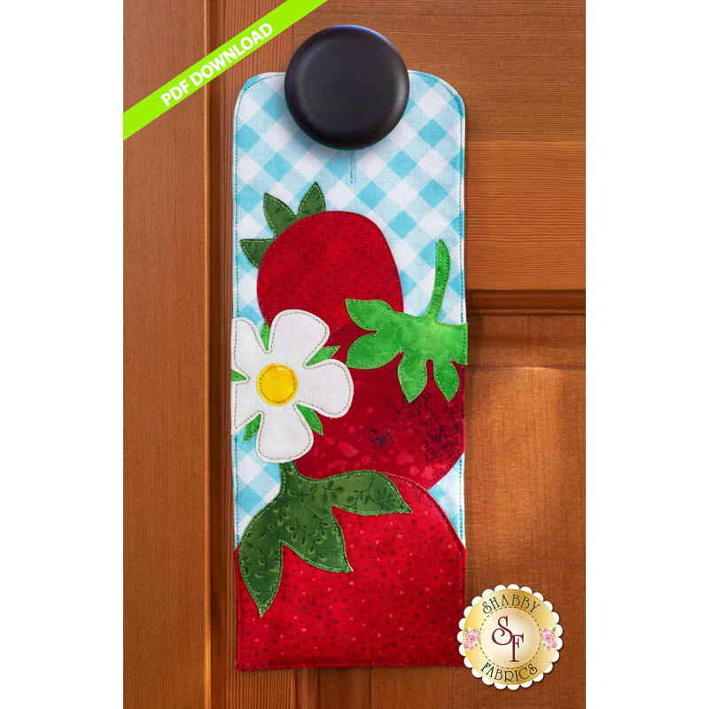 PDF Pattern for A-door-naments June with three red strawberries and strawberry blossom on blue.