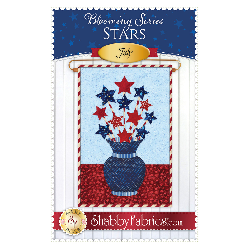The front of the Blooming Series - July pattern by Shabby Fabrics showing the finished project with a bouquet of patriotic stars.