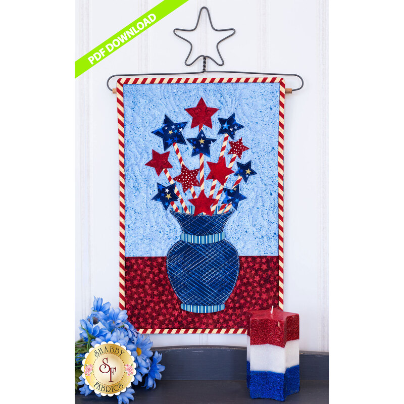 Red and blue five-pointed stars on red striped straws in a blue striped vase.