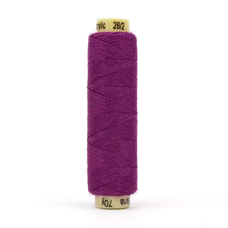 A spool of the Ellana EN37 - Very Berry thread on a white background