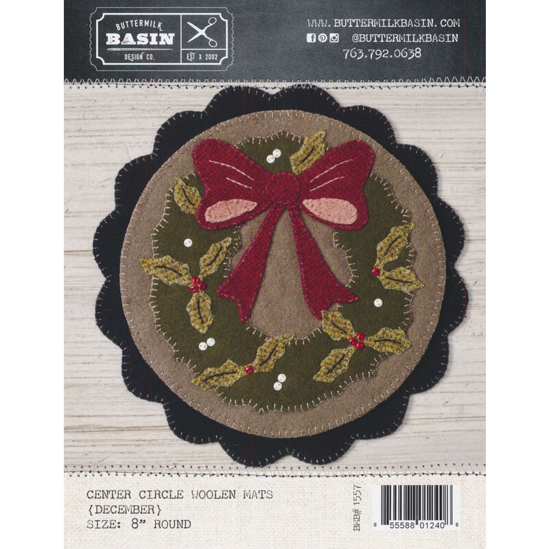 Welcome Home Center Circle Mat - December Pattern front cover showing the finished circle mat with a Christmas wreath covered in holly leaves, button berries, and a large red bow.
