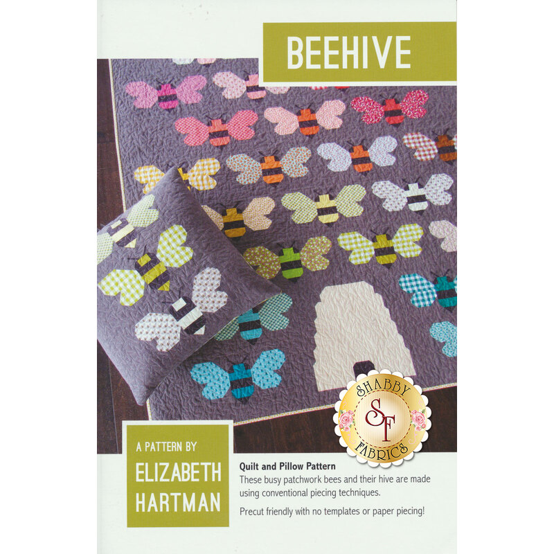 The front of the Beehive pattern showing the quilt and pillow combo