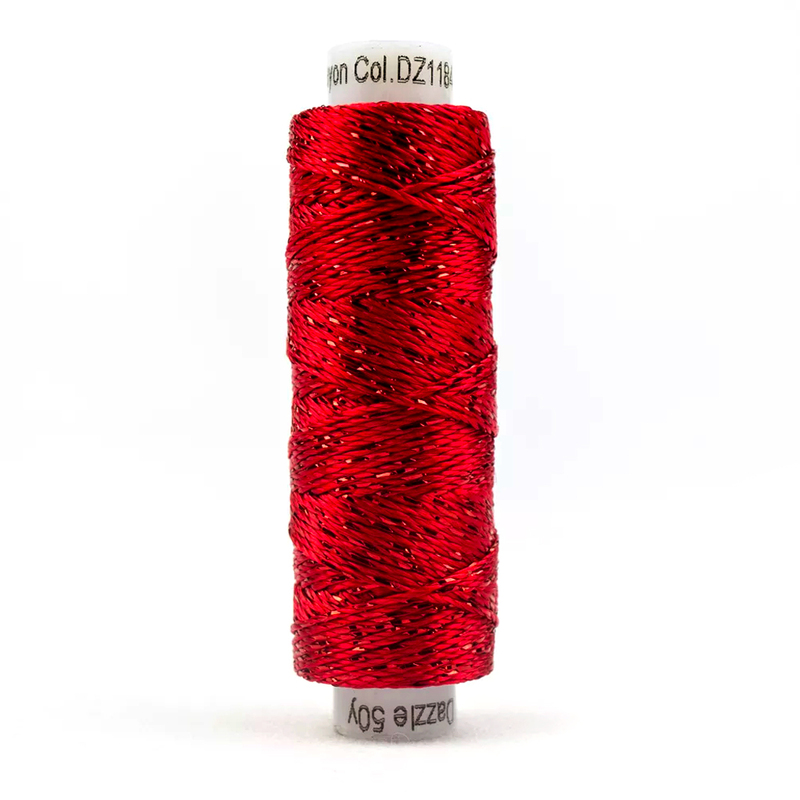 A spool of WonderFil Dazzle 1184 - Mars Red thread on a white background