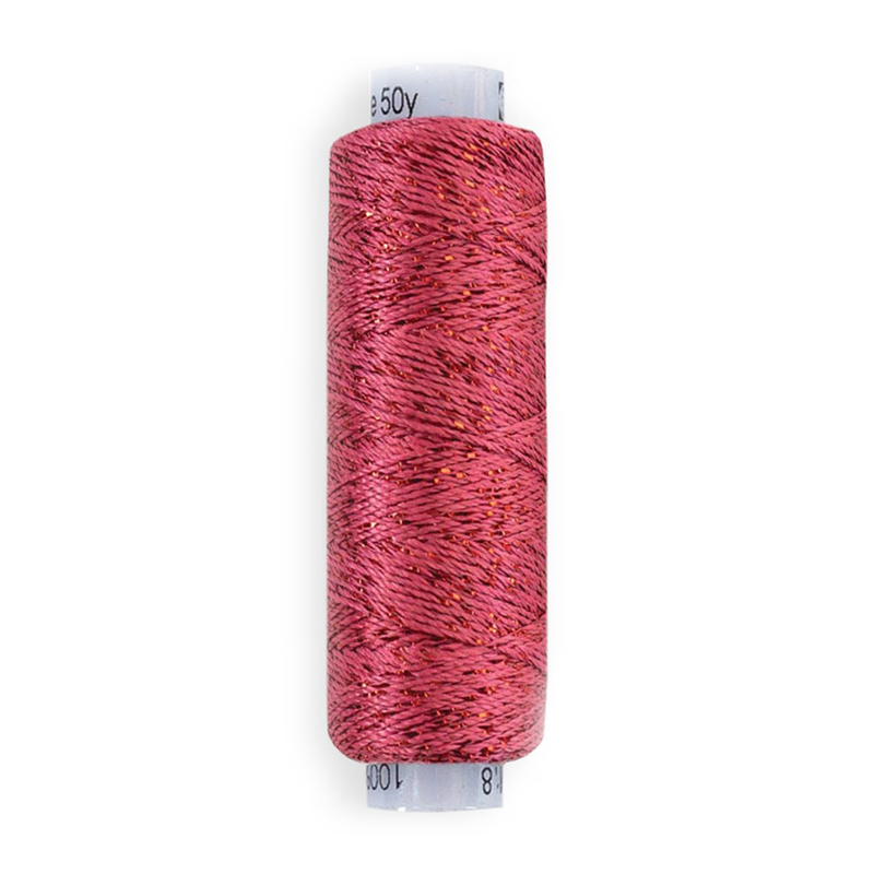 A spool of WonderFil Dazzle DZ2514 - Coral Rose thread on a white background