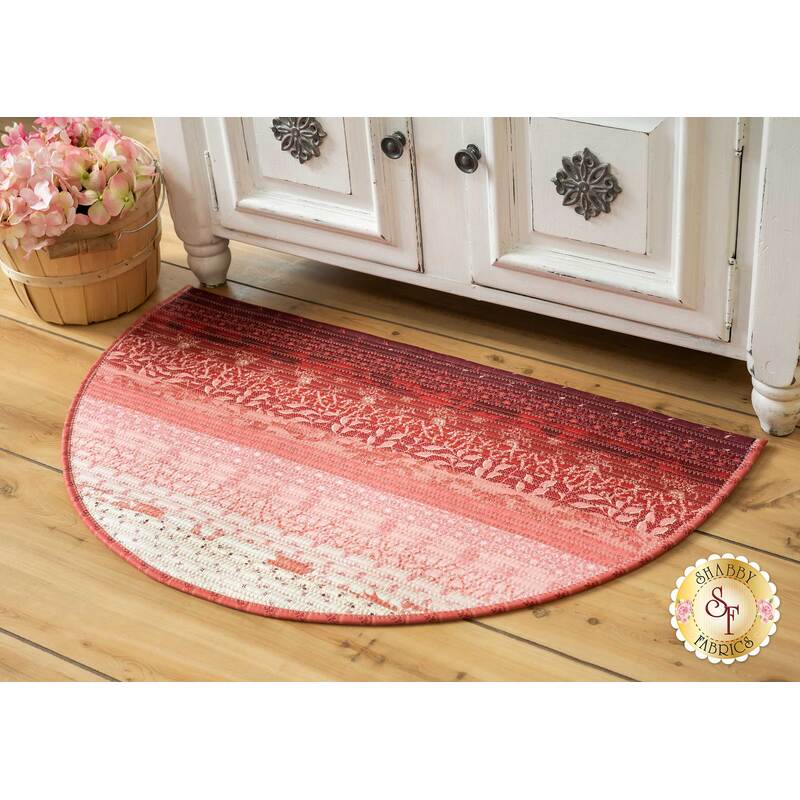 A beautiful slice rug with the Braveheart collection on a wooden floor | Shabby Fabrics