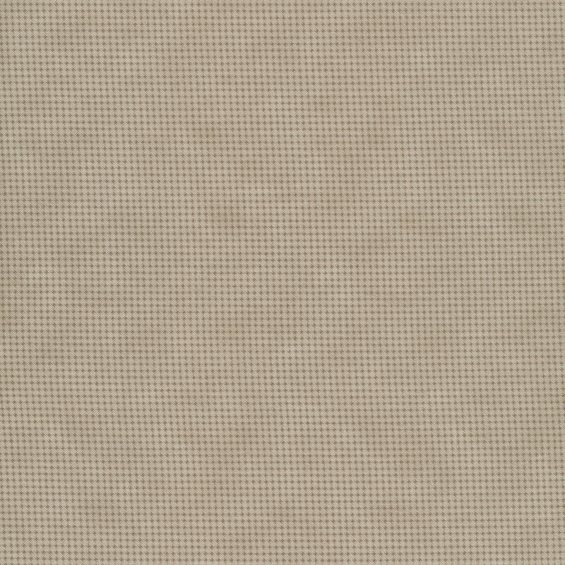 Tonal greige mottled fabric with houndstooth patterns all over