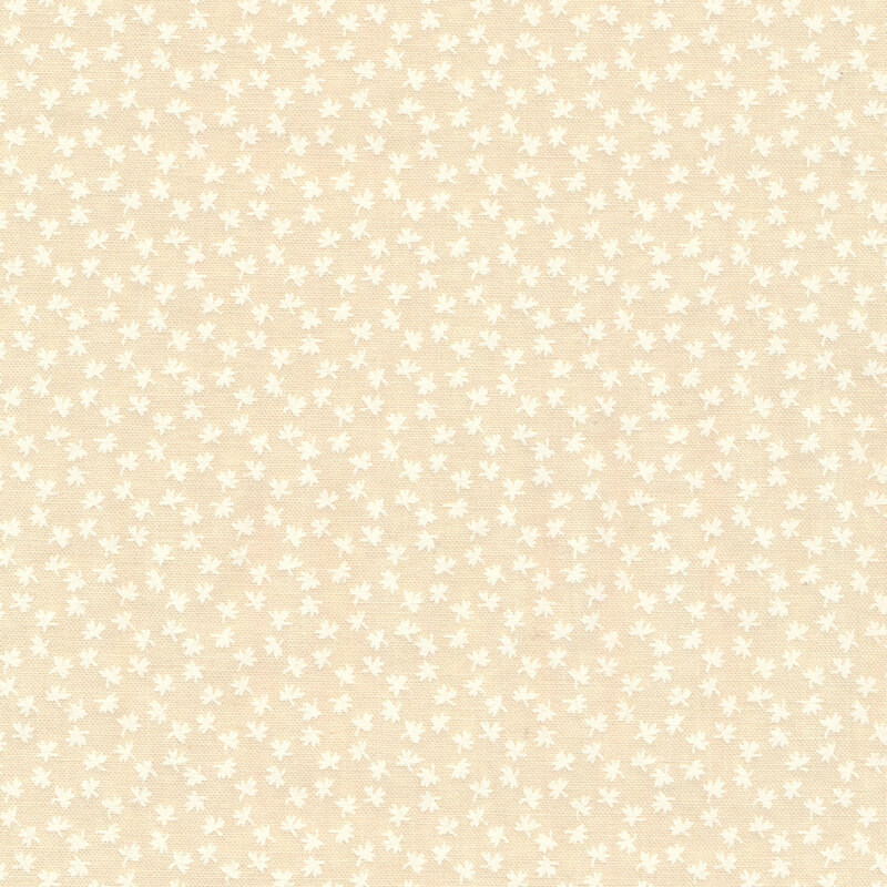 Fabric features tiny cream falling leaf pattern on tan | Shabby Fabrics