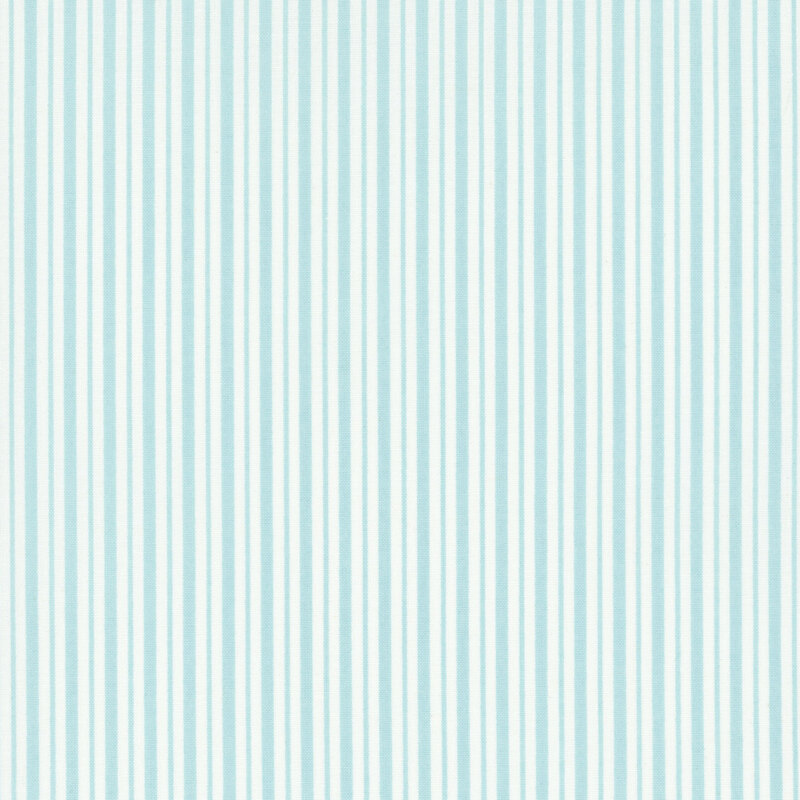 lovely white fabric featuring soft teal striping in two alternating sizes
