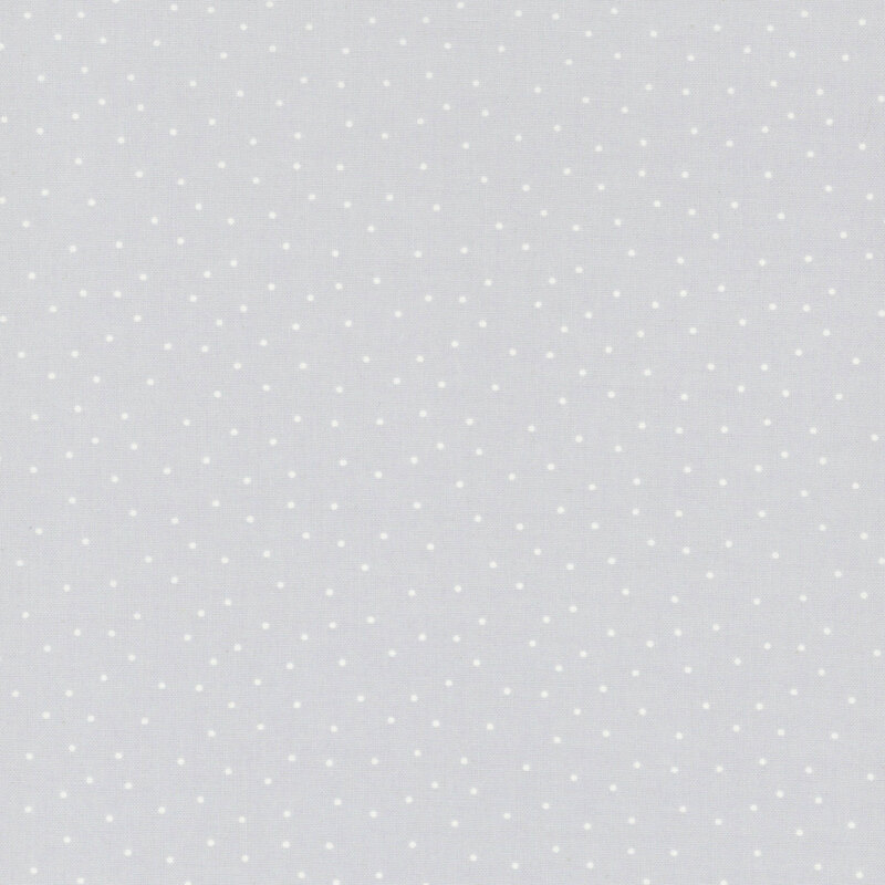 fabric featuring a light gray background with scattered small white dots