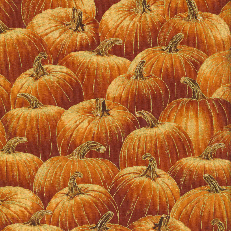 Fabric features packed orange pumpkins allover with metallic accents | Shabby Fabrics