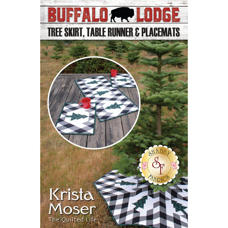 The front of the Buffalo Lodge pattern showing the finished tree skirt, table runner, and placemats