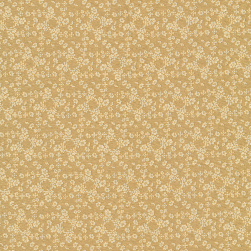 Tan fabric features tiny cream floral wreaths and wavy florals pattern | Shabby Fabrics