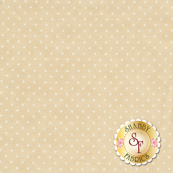 This Moda fabric features a light tan background with off white polka dots