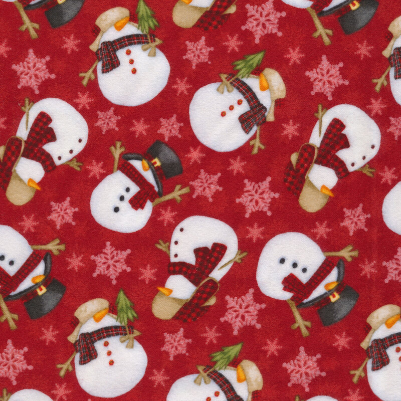 Red fabric features cream snowflakes and snowmen tossed design | Shabby Fabrics