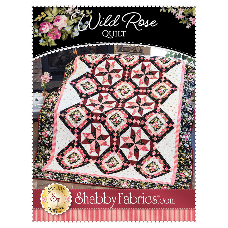 The front of the Wild Rose Quilt pattern showing the beautiful finished quilt | Shabby Fabrics