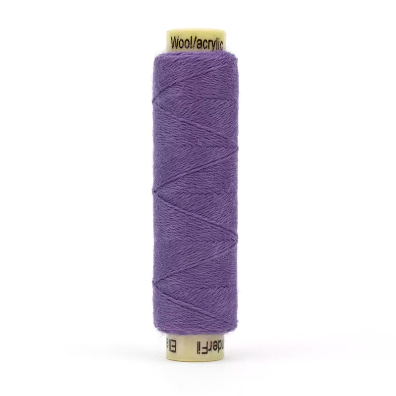 A spool of the Ellana EN58 - Lavender thread on a white background