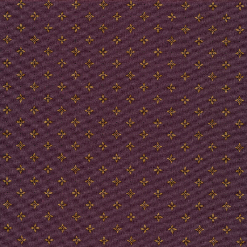 Tan star print on a plum background | Shabby Fabrics