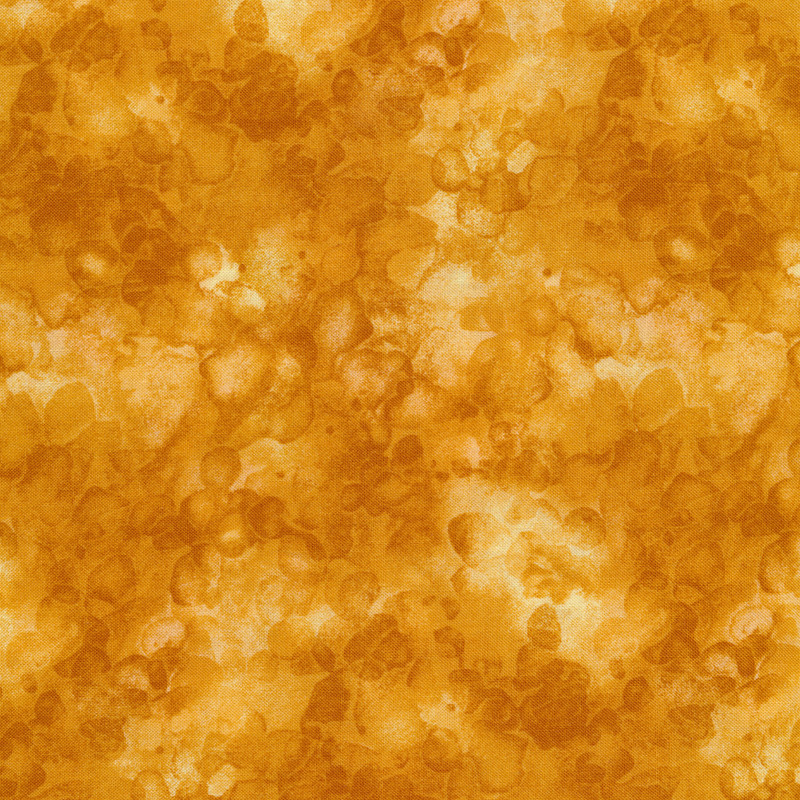 Scan of tan mottled and marbled basics fabric