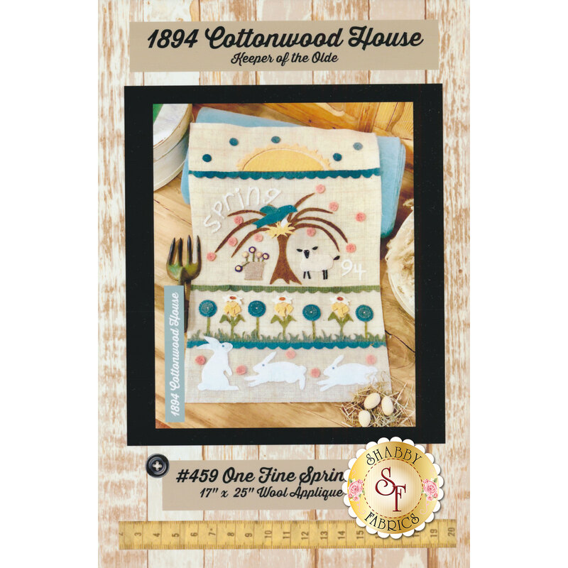 The front of the One Fine Spring Day pattern showing the finished wool quilt | Shabby Fabrics