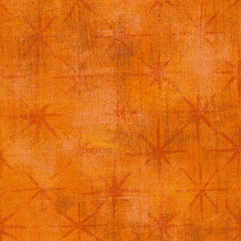 Tonal grunge textured orange fabric with dark orange stars | Shabby Fabrics