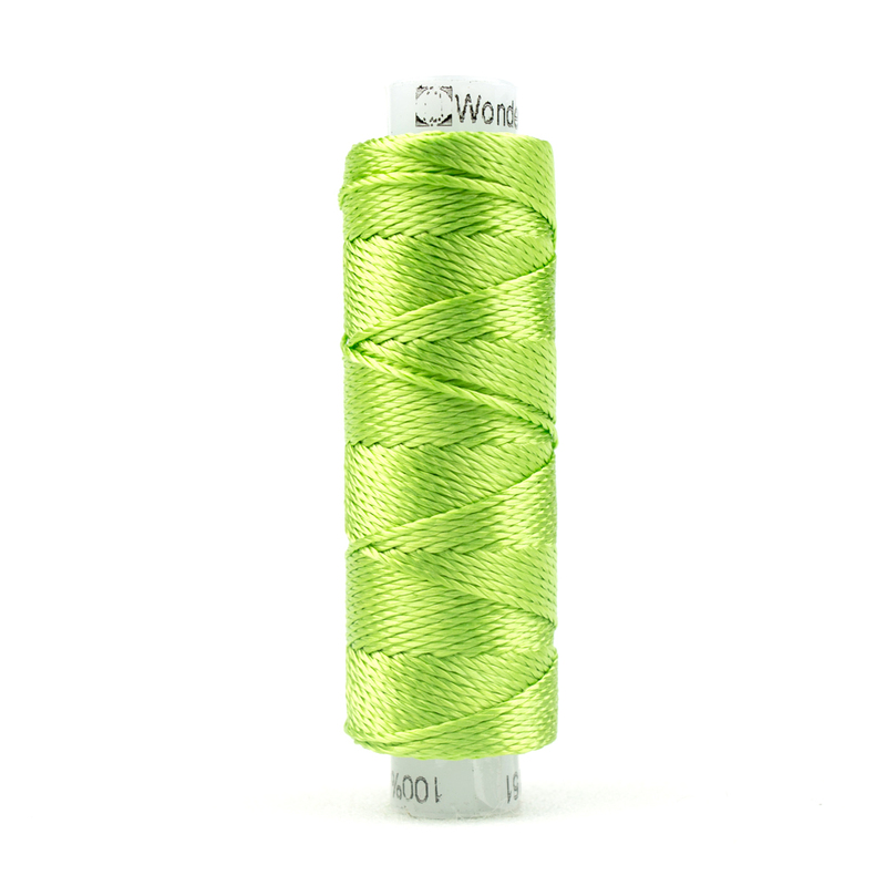 A spool of WonderFil Razzle RZ4151 Parrot Green thread on a white background