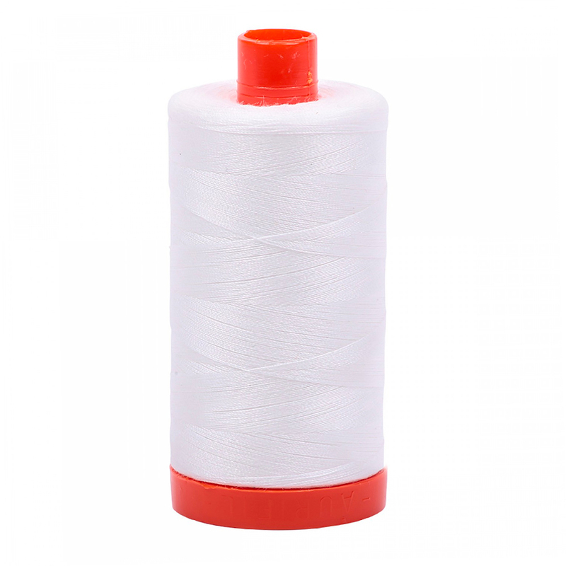 A spool of Aurifil 2021 - Natural White thread on a white background