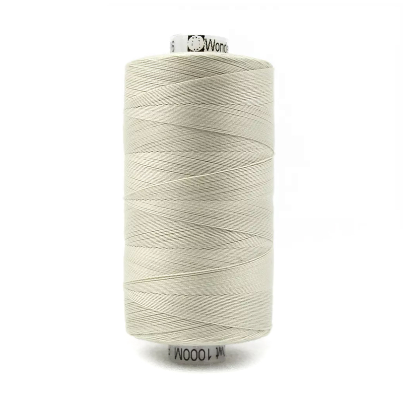 A spool of Konfetti KT906 - Pale Grey thread on a white background