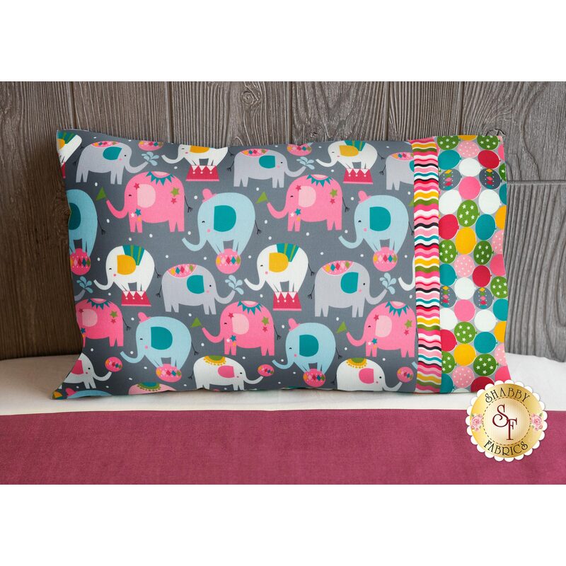 The beautiful Piccadilly Travel Pillowcase displayed on a bed | Shabby Fabrics
