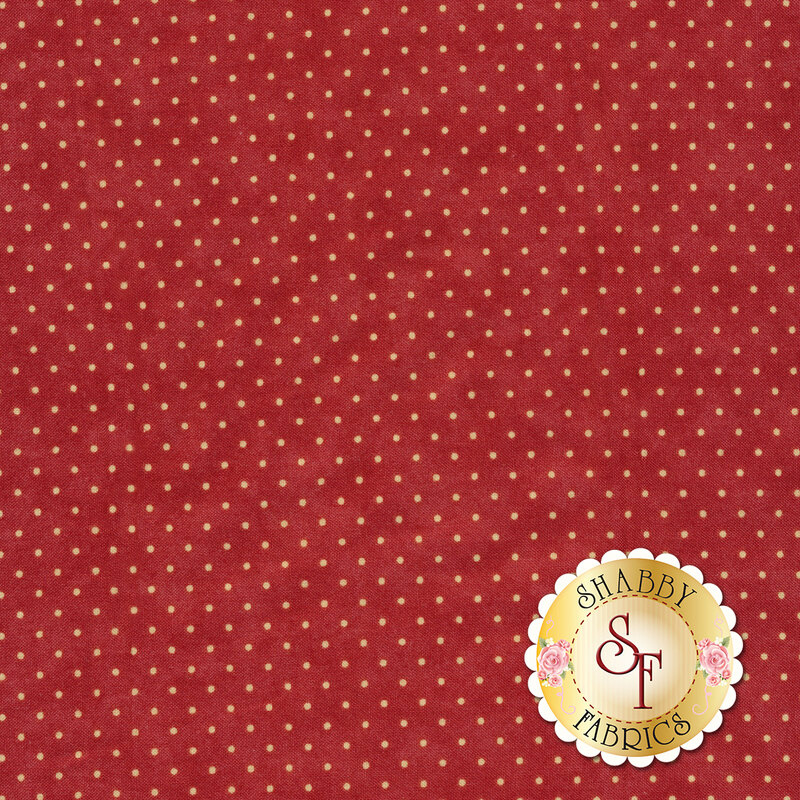 This Moda fabric features a red background with off white polka dots
