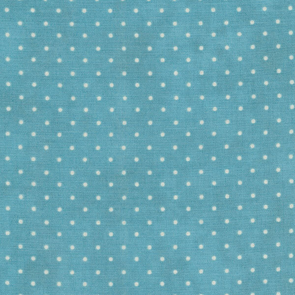 Fabric features tiny cream polka dots on mottled light teal | Shabby Fabrics