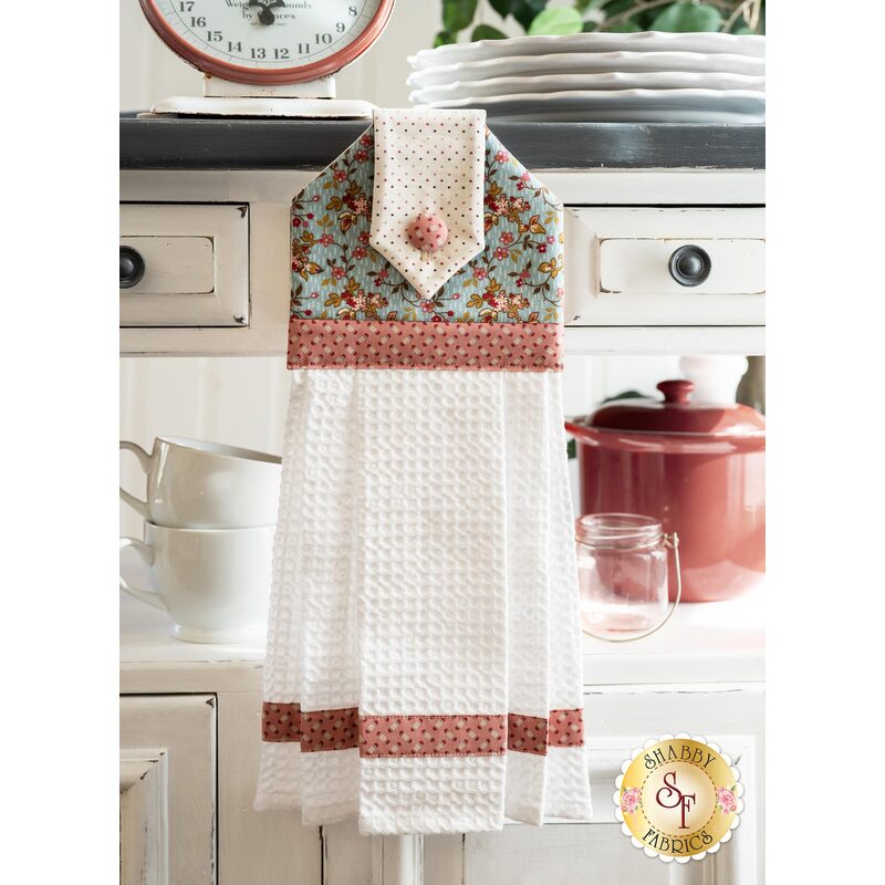 The Hanging Towel - Super Bloom - Blue hanging from a counter | Shabby Fabrics