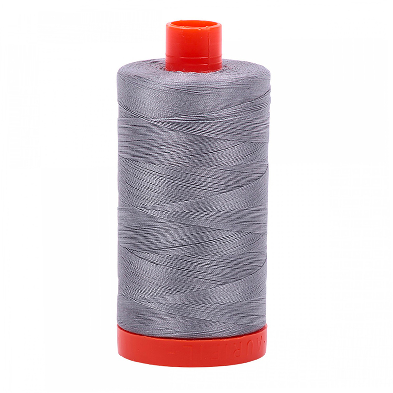 A spool of Aurigil 2605 - Grey thread on a white background