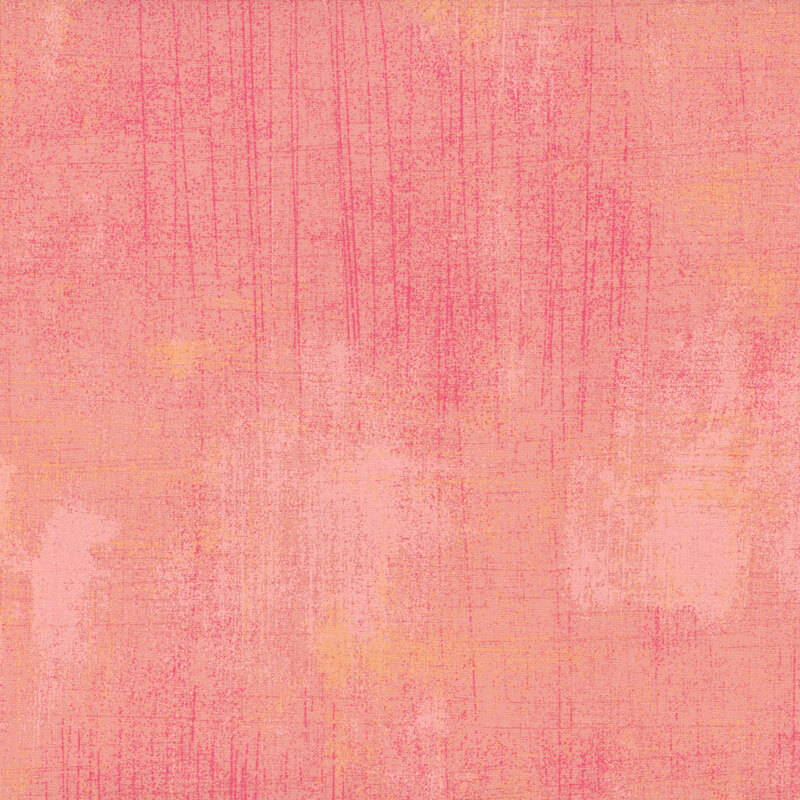 Light pink and orange grunge textured fabric