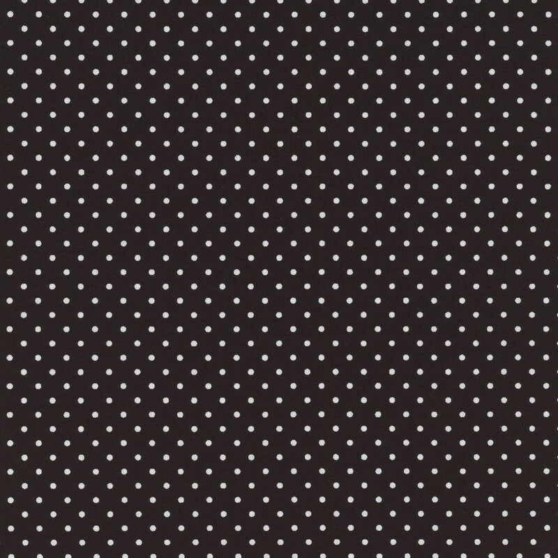Black fabric with white dots