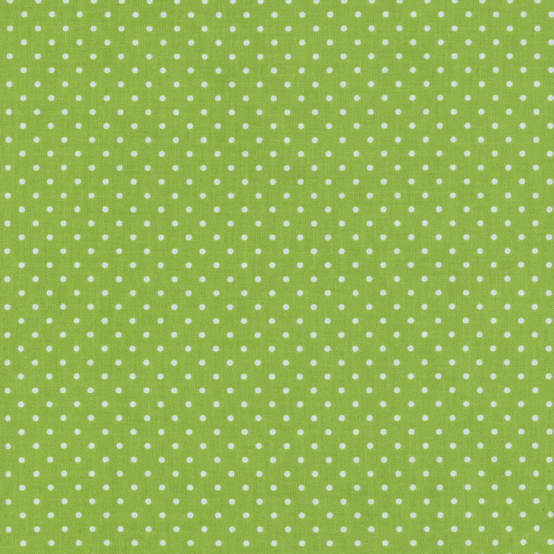 green fabric with small white dots